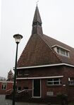 Het kerkdak met duidelijk zichtbaar een van de dakkapellen.
              <br/>
              Richard Keijzer, 2009-01-23